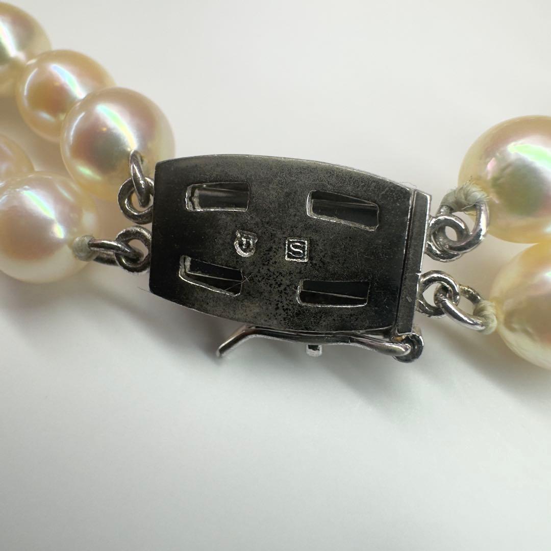 Tasaki silver 2-strand bracelet with approximately 6.0-6.2mm pearls measuring about 19cm