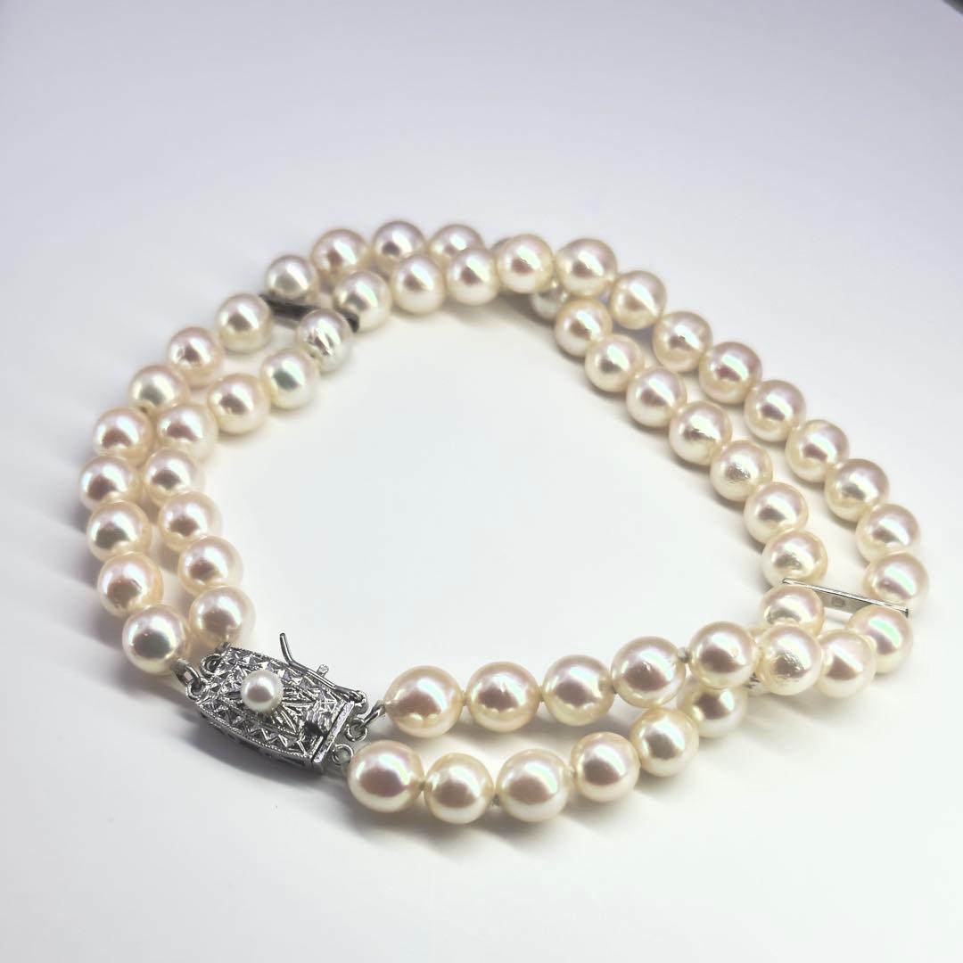 Tasaki silver 2-strand bracelet with approximately 6.0-6.2mm pearls measuring about 19cm