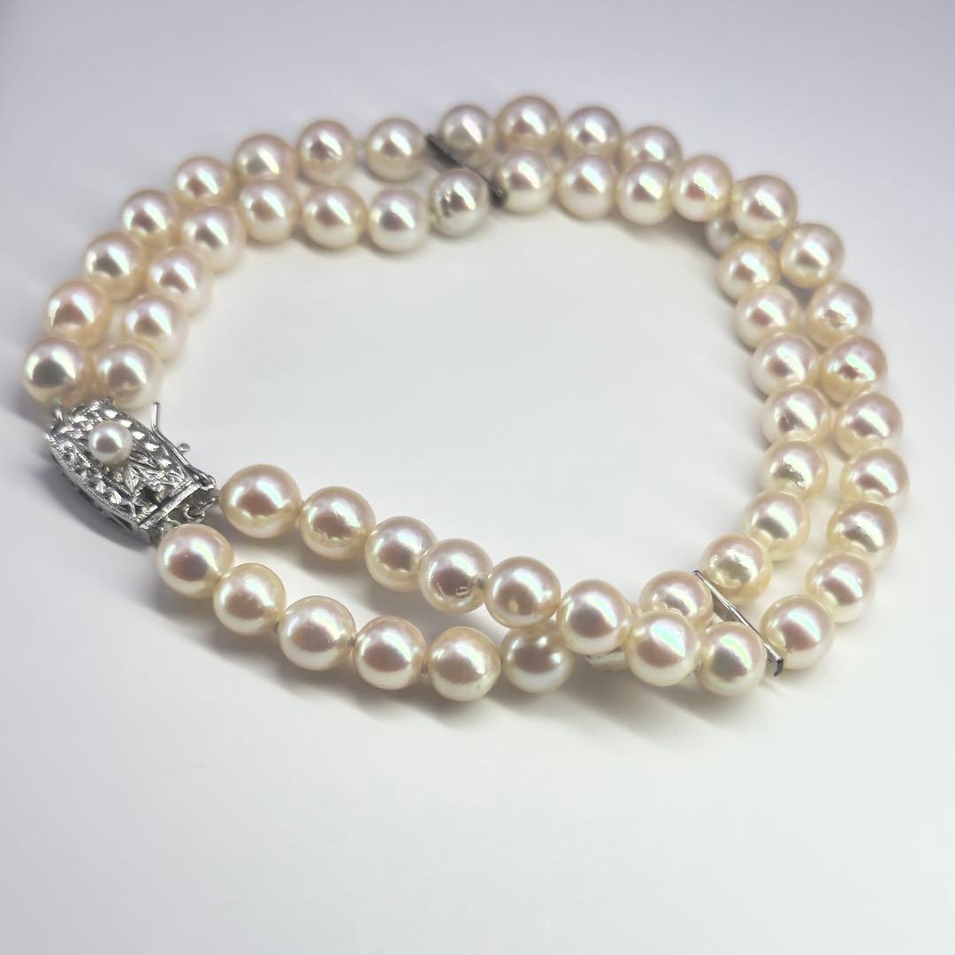 Tasaki silver 2-strand bracelet with approximately 6.0-6.2mm pearls measuring about 19cm