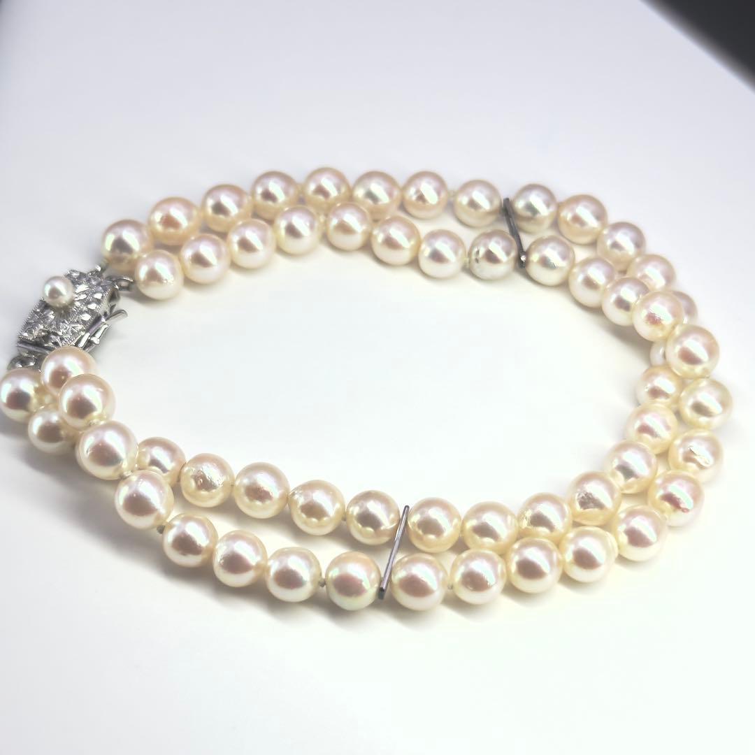 Tasaki silver 2-strand bracelet with approximately 6.0-6.2mm pearls measuring about 19cm