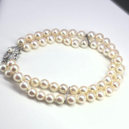 Tasaki silver 2-strand bracelet with approximately 6.0-6.2mm pearls measuring about 19cm