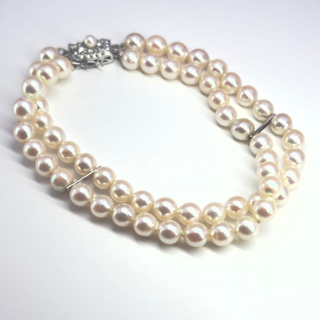 Tasaki silver 2-strand bracelet with approximately 6.0-6.2mm pearls measuring about 19cm