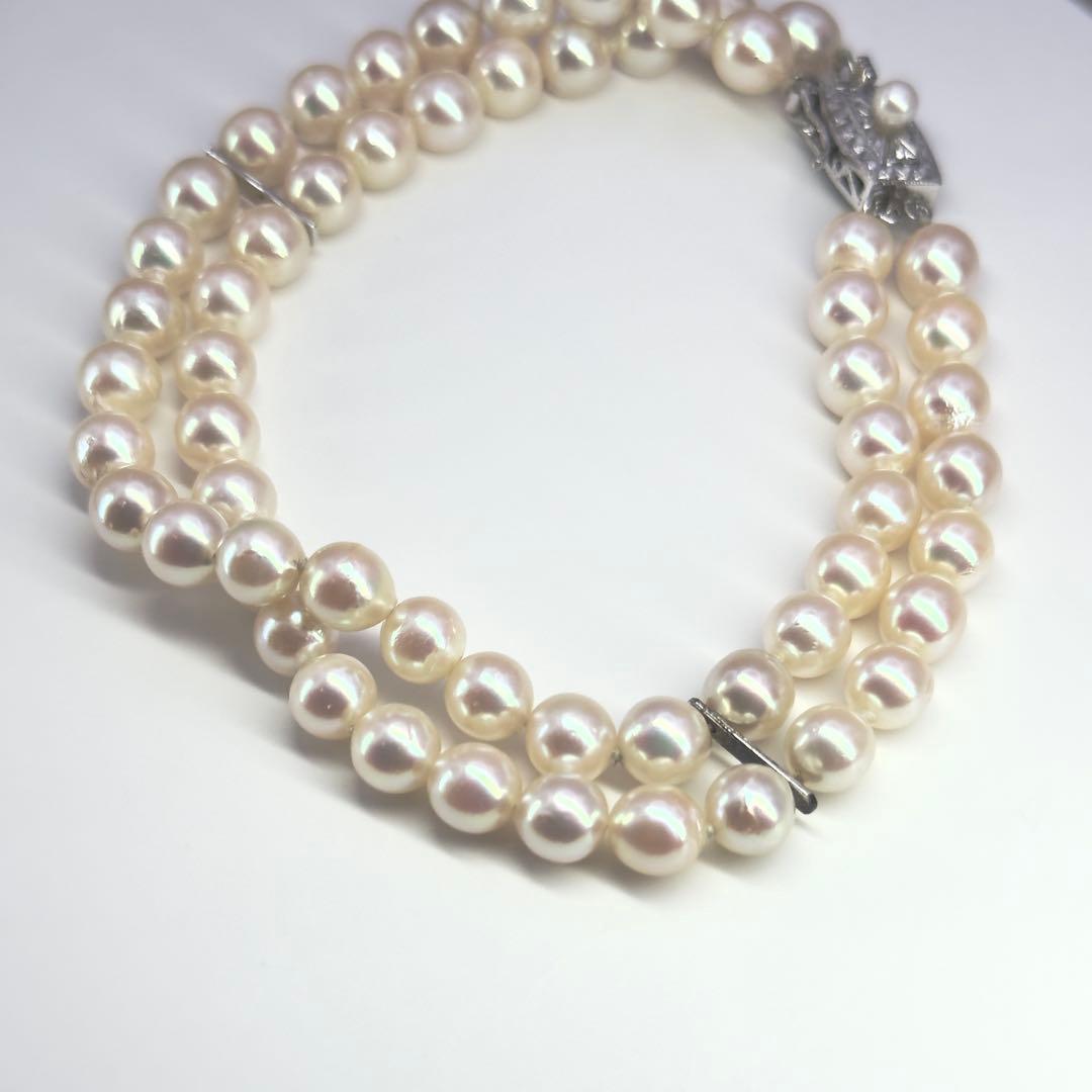 Tasaki silver 2-strand bracelet with approximately 6.0-6.2mm pearls measuring about 19cm