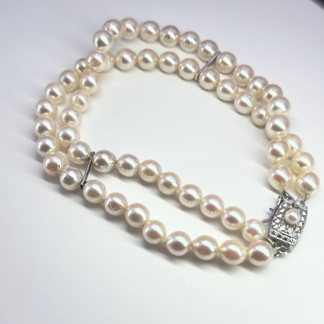 Tasaki silver 2-strand bracelet with approximately 6.0-6.2mm pearls measuring about 19cm