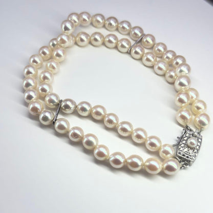 Tasaki silver 2-strand bracelet with approximately 6.0-6.2mm pearls measuring about 19cm