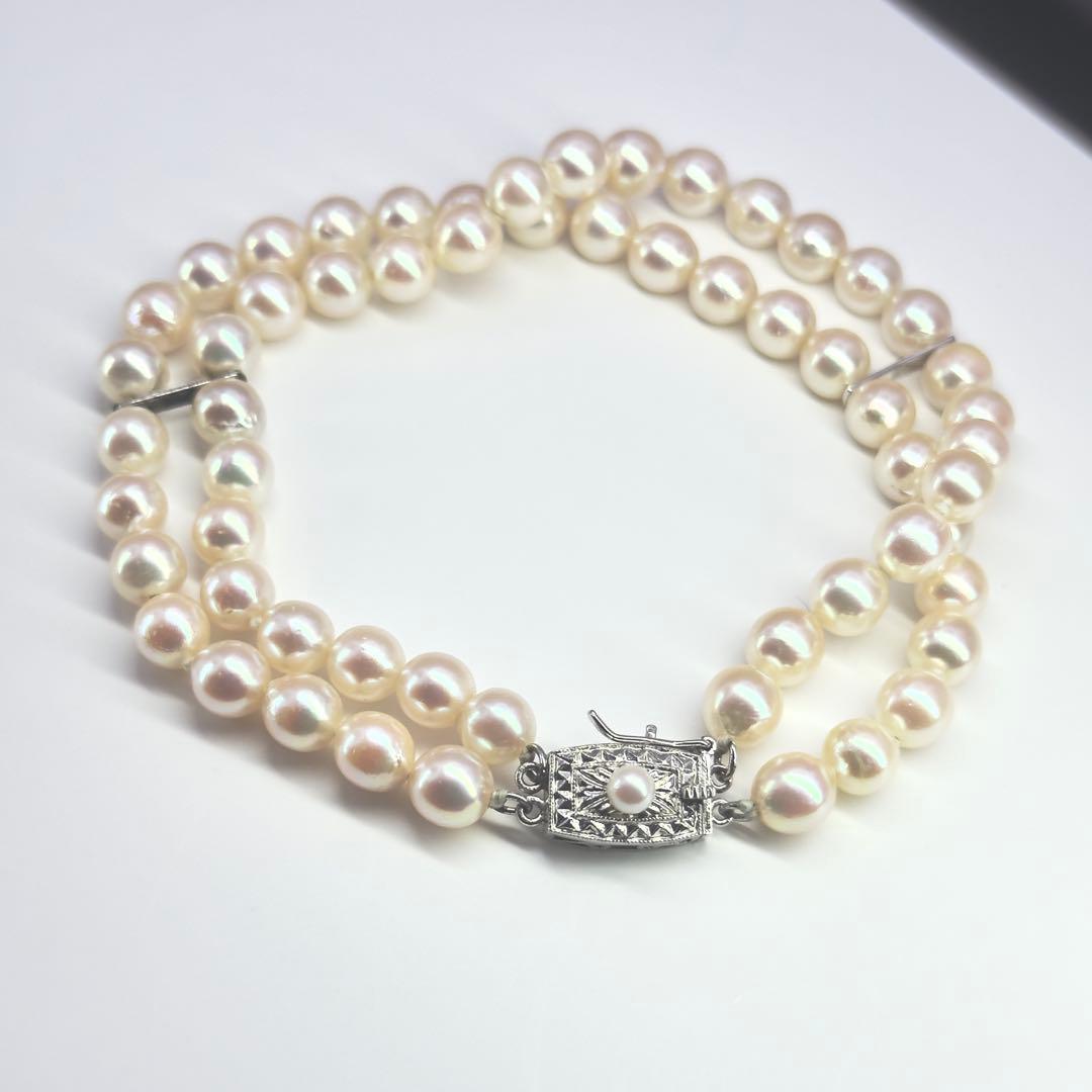 Tasaki silver 2-strand bracelet with approximately 6.0-6.2mm pearls measuring about 19cm