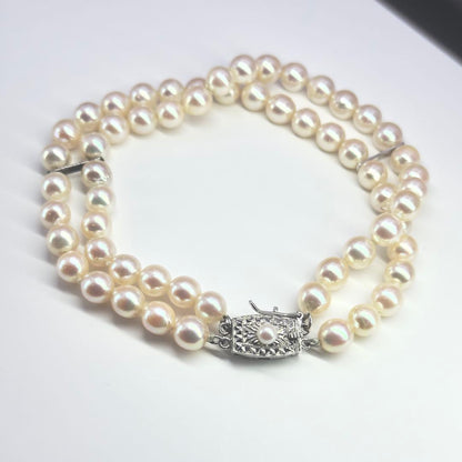 Tasaki silver 2-strand bracelet with approximately 6.0-6.2mm pearls measuring about 19cm