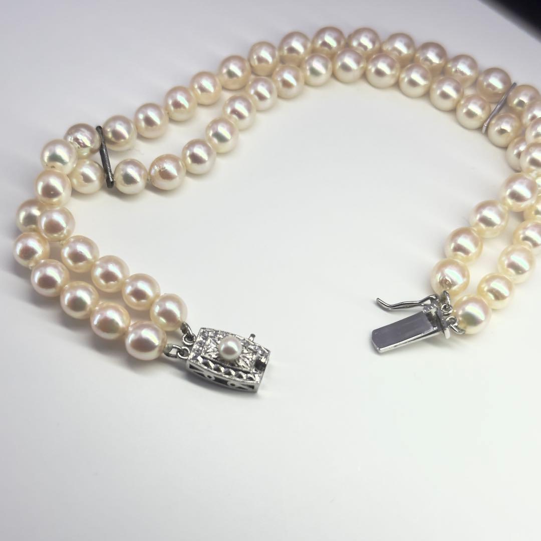 Tasaki silver 2-strand bracelet with approximately 6.0-6.2mm pearls measuring about 19cm