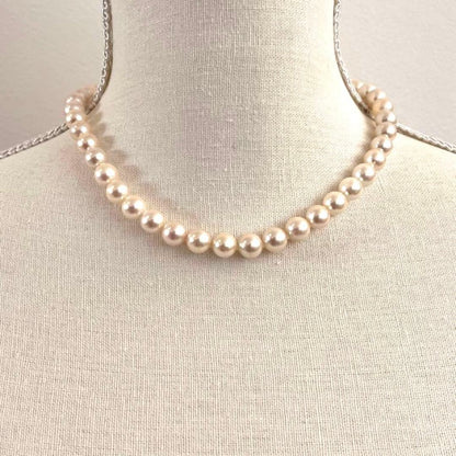 Akoya pearl necklace featuring white pearls sized 8.5mm to 9mm with a silver clasp, 41cm long