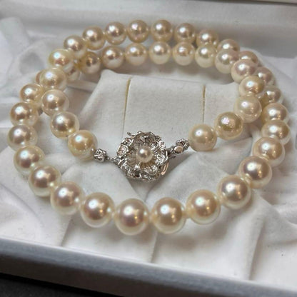 Akoya pearl necklace featuring white pearls sized 8.5mm to 9mm with a silver clasp, 41cm long