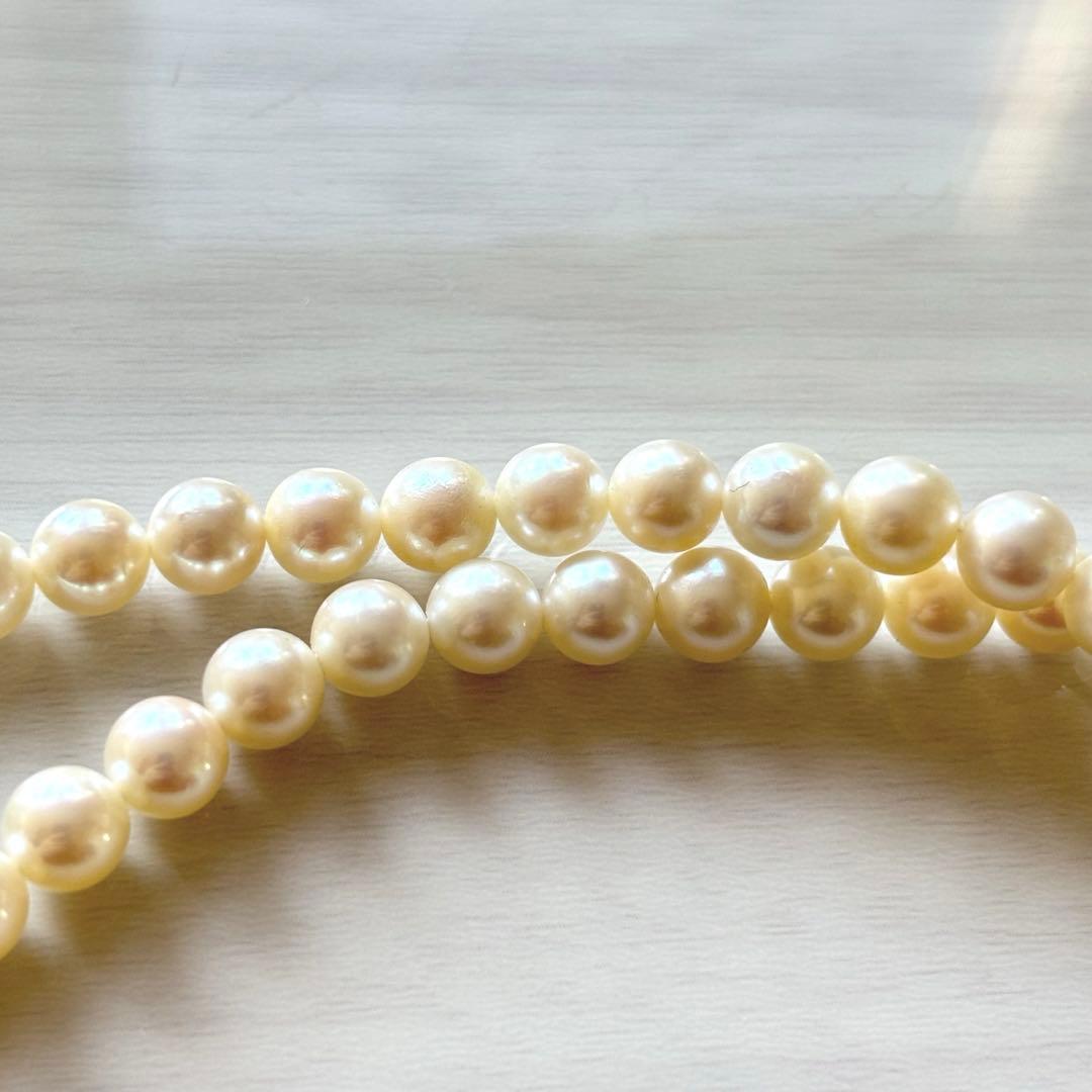 Honmono Pearls two-strand necklace featuring 6mm round white pearls on a 42.5 cm length strand