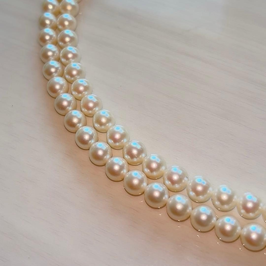 Honmono Pearls two-strand necklace featuring 6mm round white pearls on a 42.5 cm length strand
