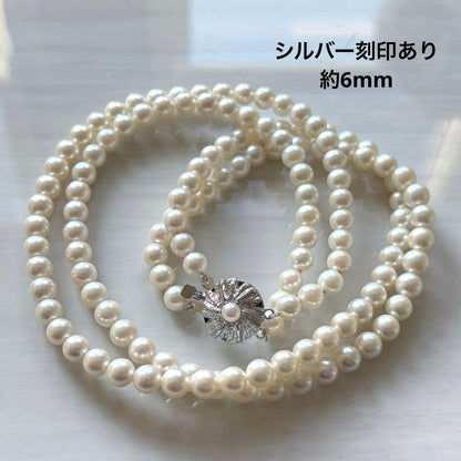 Honmono Pearls two-strand necklace featuring 6mm round white pearls on a 42.5 cm length strand