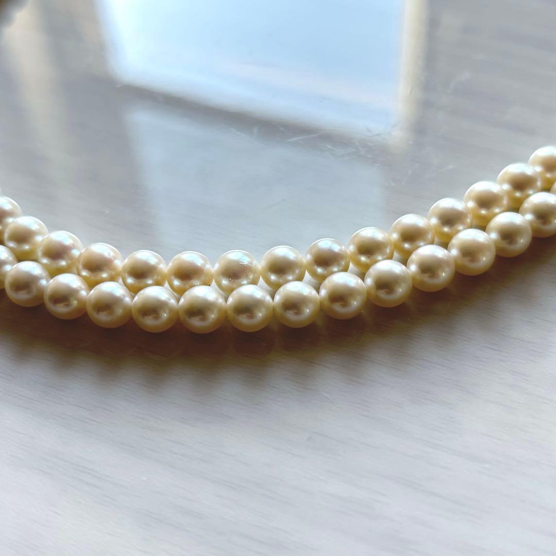 Honmono Pearls two-strand necklace featuring 6mm round white pearls on a 42.5 cm length strand