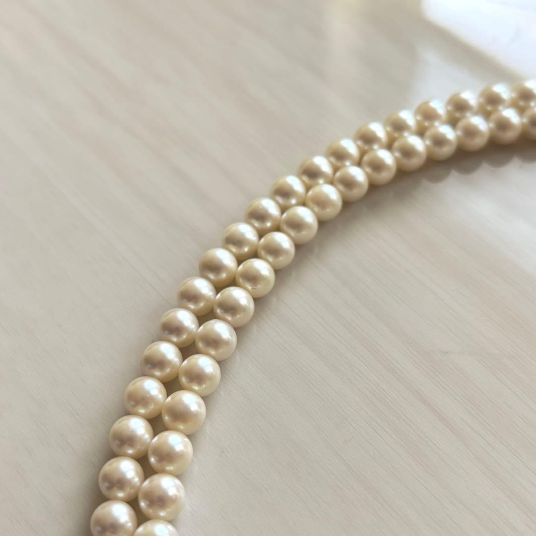Honmono Pearls two-strand necklace featuring 6mm round white pearls on a 42.5 cm length strand