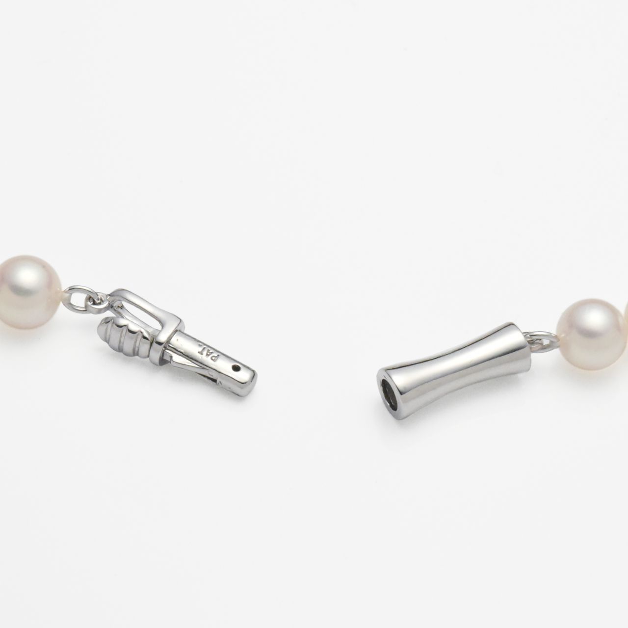 Akoya pearl necklace with small 5.5-6mm pearls on a 42cm strand featuring a silver clasp