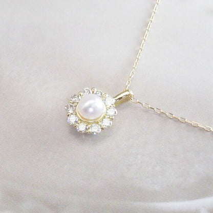 18K gold necklace with 3mm baby Akoya pearl and 10 small diamonds on a delicate chain model tc-0129