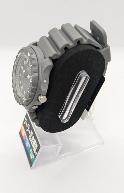 Citizen Q&Q gray analog solar radio wave wristwatch with urethane band and 10 bar water resistance