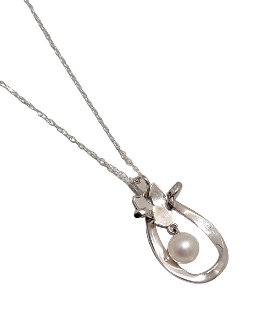 Mikimoto pearl pendant head with 6.5mm pearl on SV925 silver setting measuring 1.5x3 cm displayed on white background