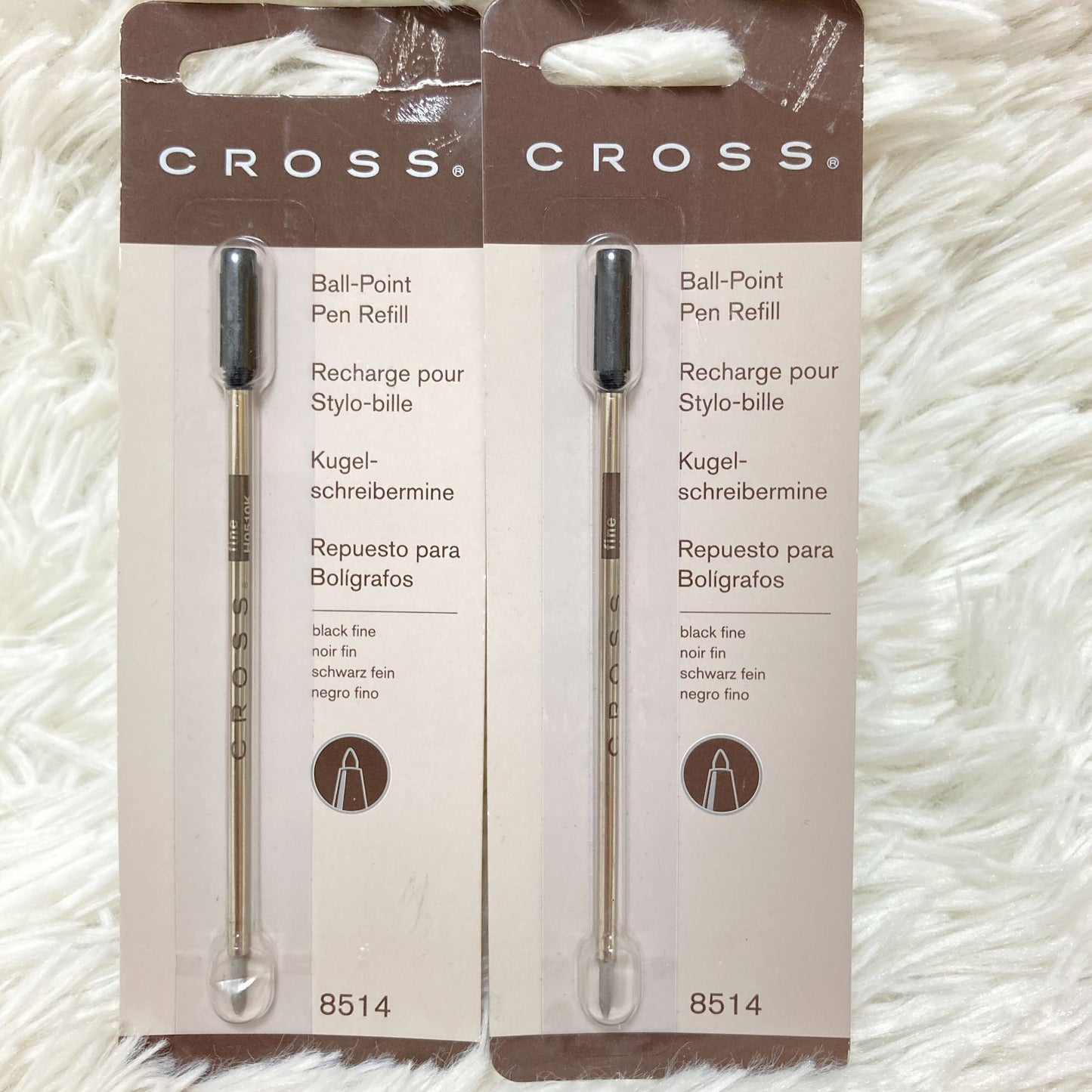 Set of seven CROSS Kuro ballpoint pen refills in black and brown with model numbers 8513 and 8514