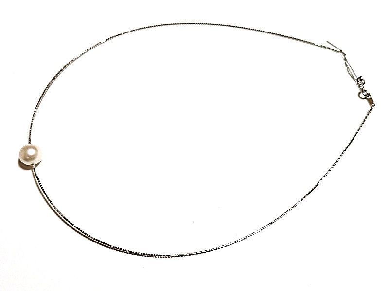 Akoya pearl Omega thread necklace with 9.5mm-9mm white slight pink round pearls and thick wrap