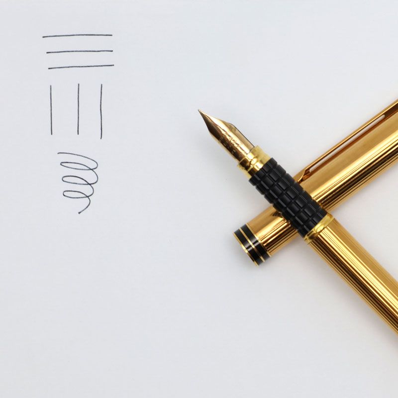 Waterman black and gold fountain pen with K18 nib, 14.2 cm length, 1.0 cm diameter