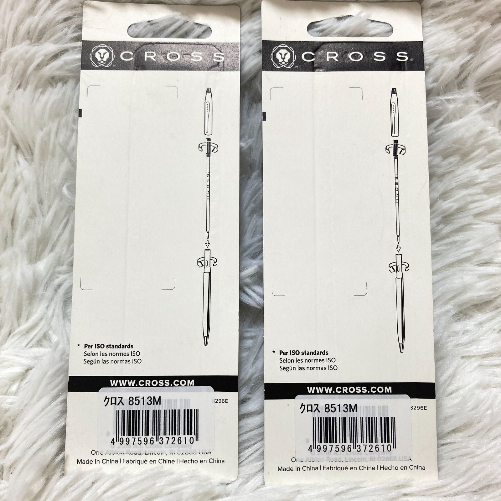 Set of seven CROSS Kuro ballpoint pen refills in black and brown with model numbers 8513 and 8514