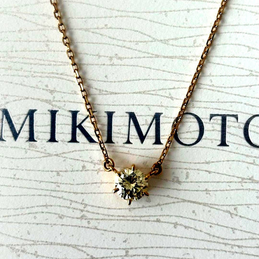Mikimoto 084 necklace in K18 gold with a single 0.66ct diamond pendant weighing 10.2 grams