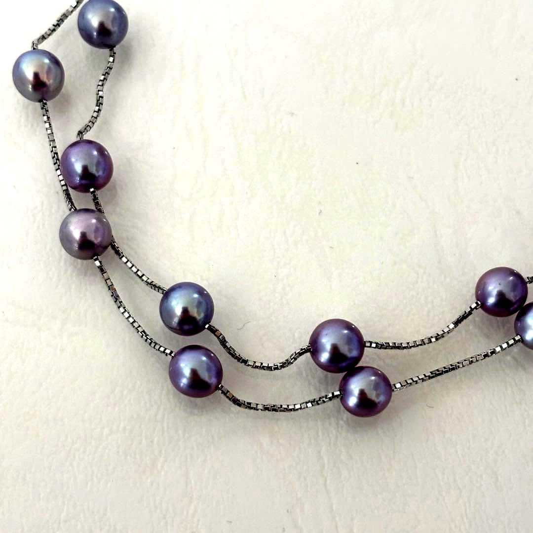 186Tasaki K18 station necklace with purple pearls, 44cm adjustable chain on white background