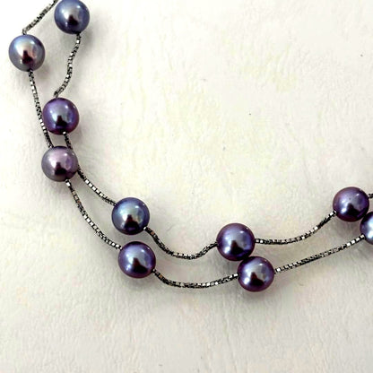 186Tasaki K18 station necklace with purple pearls, 44cm adjustable chain on white background