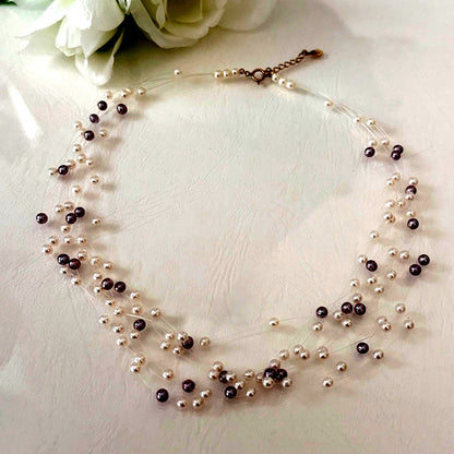 250Tasaki K18 8-row pearl necklace with white and purple pearls, 43 cm long