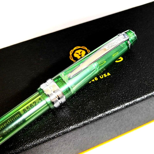 Cross Creamsoda Bailey Light ballpoint pen in clear blue, green, and pink with transparent resin body