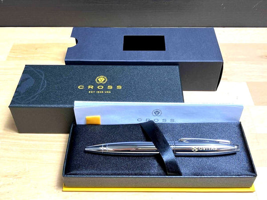 Cross brand twist ballpoint pen shown with box and engraved corporate name
