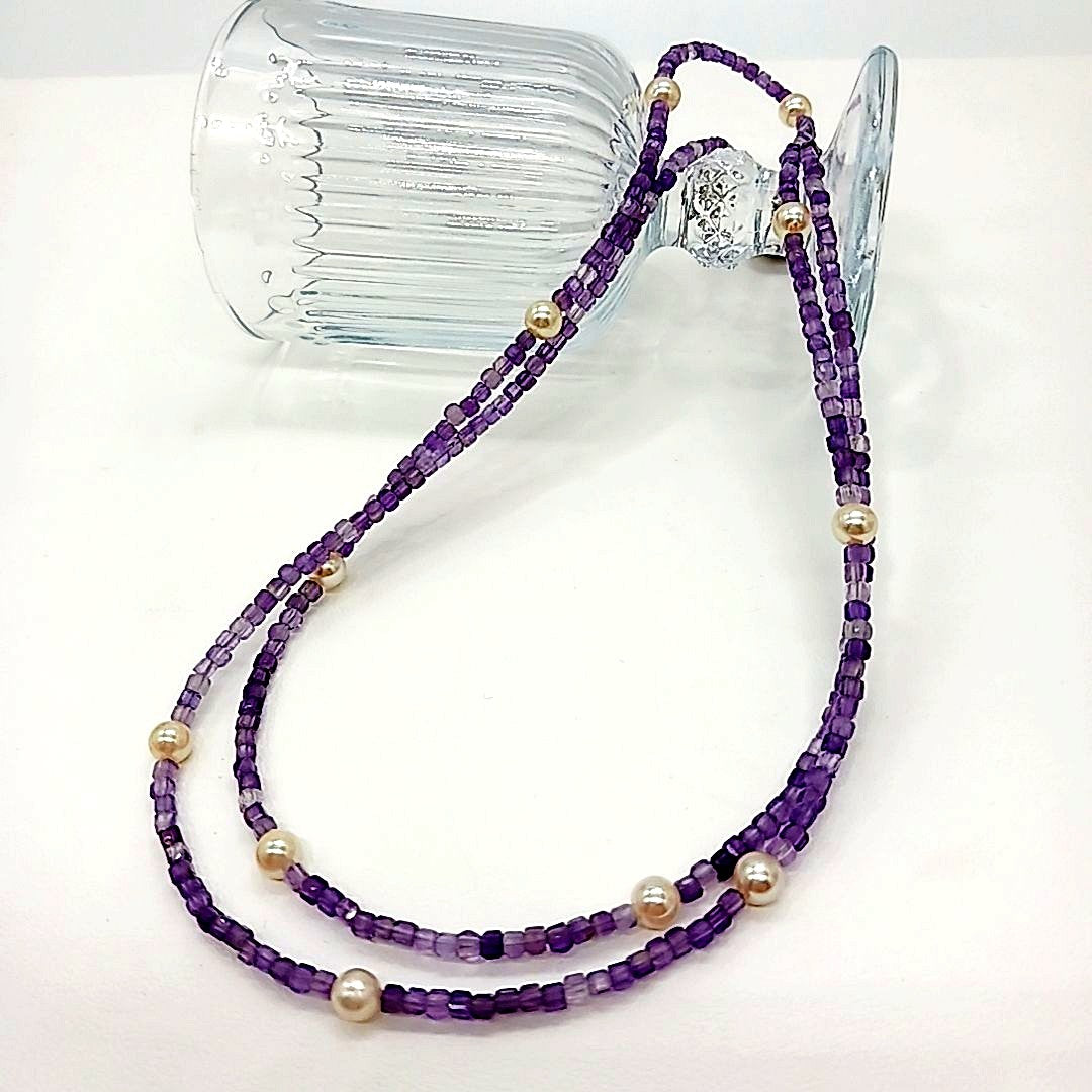 Akoya baby pearl and amethyst necklace with cream pearls and silver chain approximately 73 centimeters long