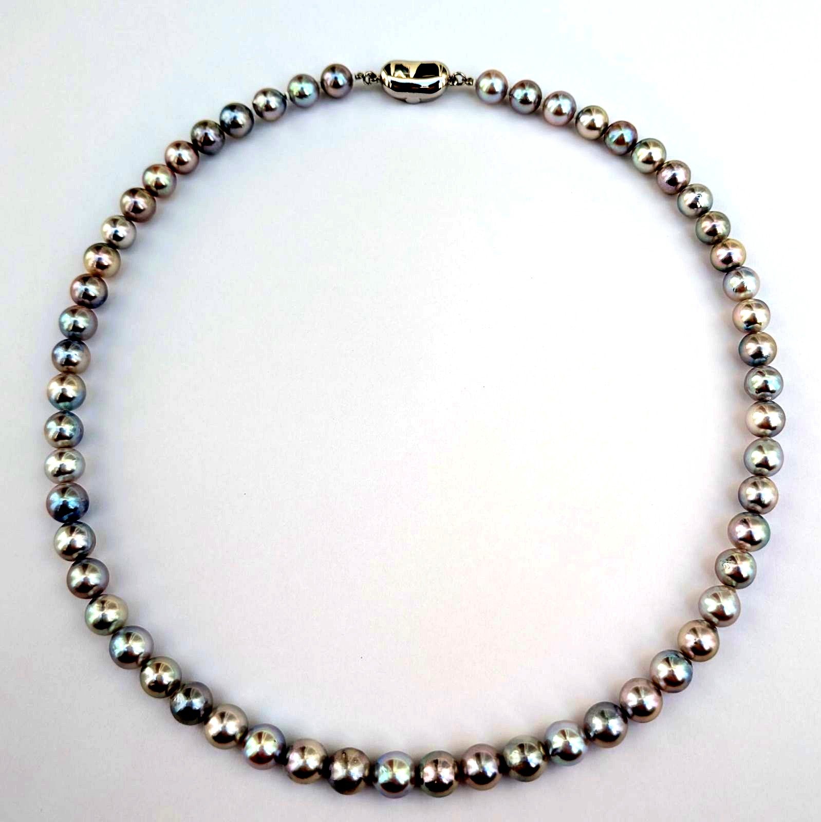 Akoya pearl necklace with natural gray 7-7.5mm pearls and silver fittings displayed on white background