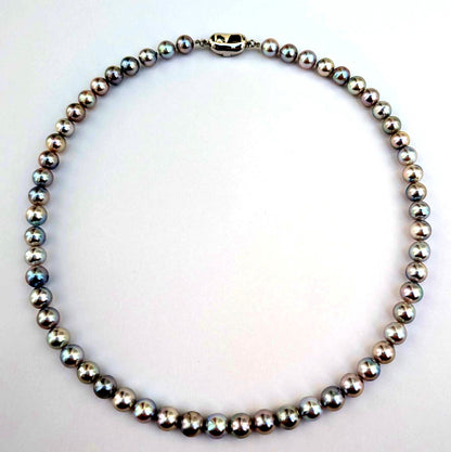 Akoya pearl necklace with natural gray 7-7.5mm pearls and silver fittings displayed on white background
