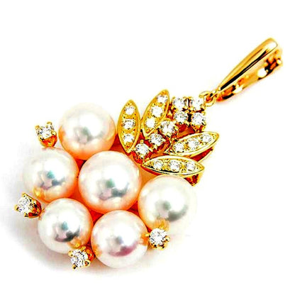 Mikimoto K18 gold pendant with six pearls and diamond accents measuring 21.2mm by 37.9mm