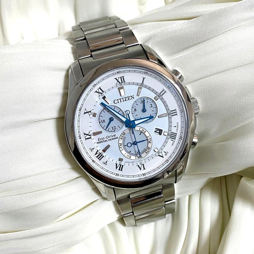 CITIZEN Eco-Drive Perpetual Calendar men's watch model E820-R006592 with silver case and black leather strap