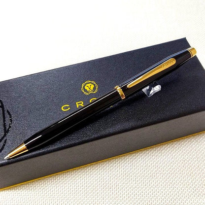 Cross Century II Black Lacquer Ballpoint Pen with metal body, gold clip, and twist mechanism