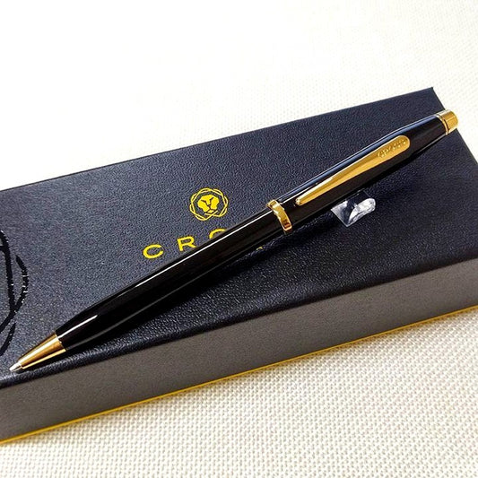 Cross Century II Black Lacquer Ballpoint Pen with metal body, gold clip, and twist mechanism