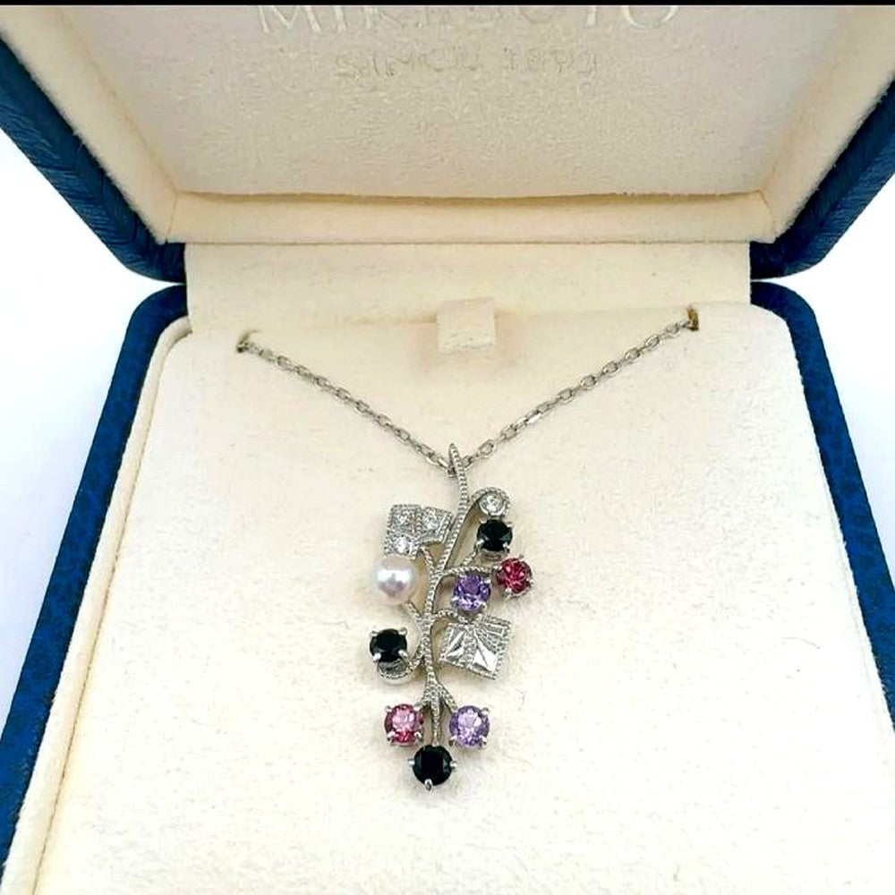 Mikimoto Akoya pearl necklace featuring amethyst, onyx, and tourmaline gemstones with 42cm chain length