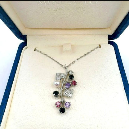 Mikimoto Akoya pearl necklace featuring amethyst, onyx, and tourmaline gemstones with 42cm chain length