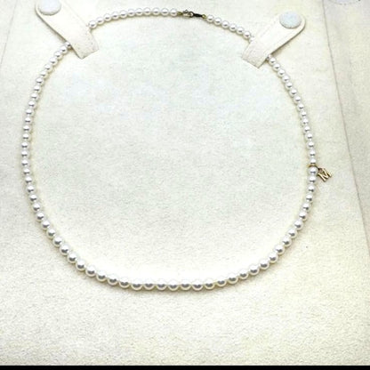 Mikimoto Baby Pearl Necklace with white pearls and K18 gold clasp, 41 cm length, simple elegant design