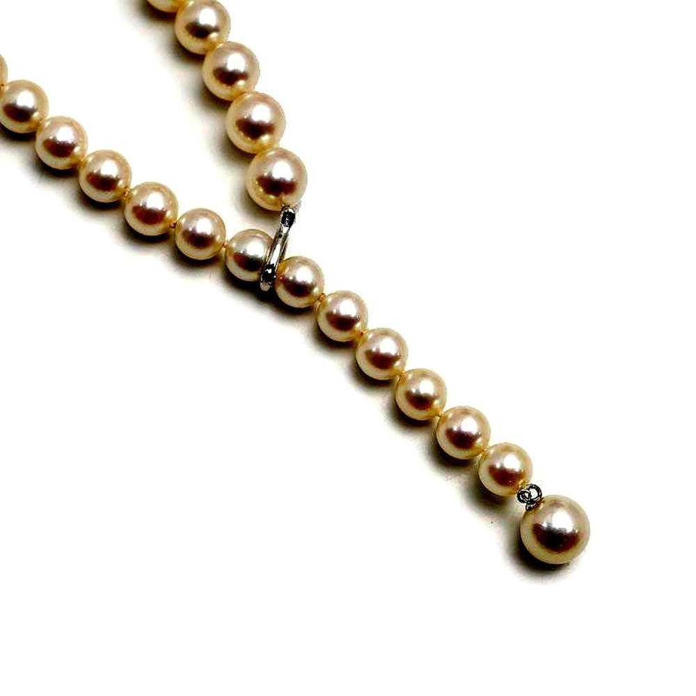 Single strand pearl necklace with 7-9mm Akoya cultured pearls set in K18WG metal, 54 cm long