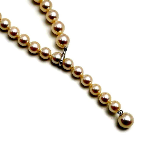 Single strand pearl necklace with 7-9mm Akoya cultured pearls set in K18WG metal, 54 cm long