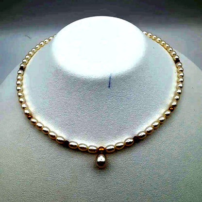 Tasaki pearl necklace with 4mm pearls, ruby gemstones, and K18 gold chain, 37cm length