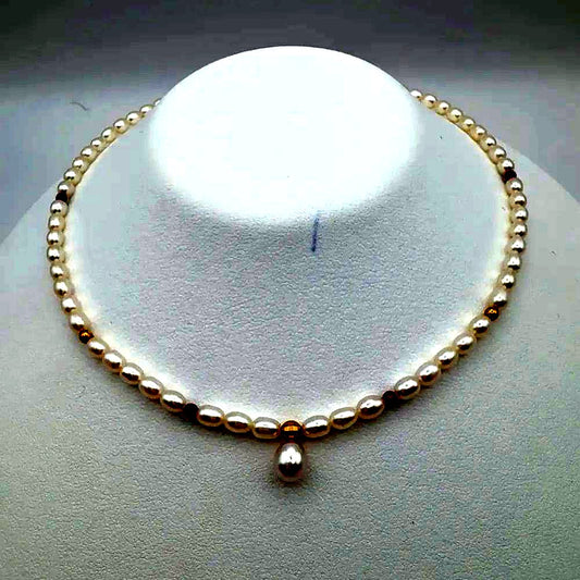 Tasaki pearl necklace with 4mm pearls, ruby gemstones, and K18 gold chain, 37cm length