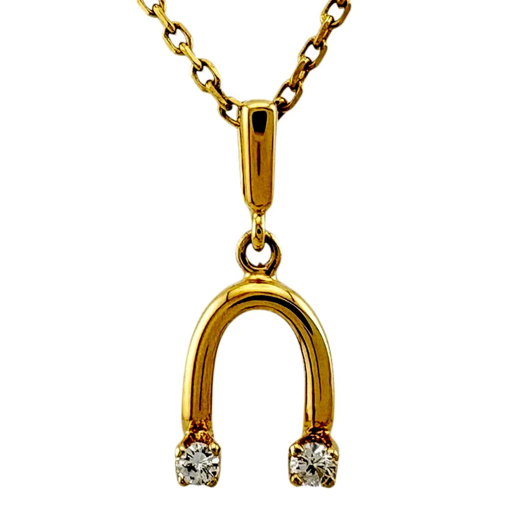 Mikimoto ladies necklace in 18K yellow gold featuring a diamond, weighing approximately 2.6g