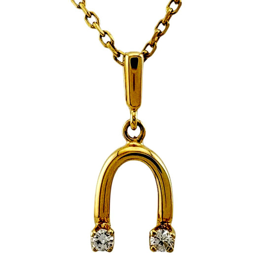 Mikimoto ladies necklace in 18K yellow gold featuring a diamond, weighing approximately 2.6g