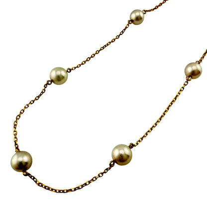 Mikimoto ladies necklace with 18K yellow gold chain and single Akoya pearl pendant weighing 3.9 grams